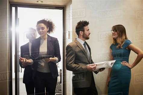 Business Team Leaving Office Meeting Stock Photo Dissolve