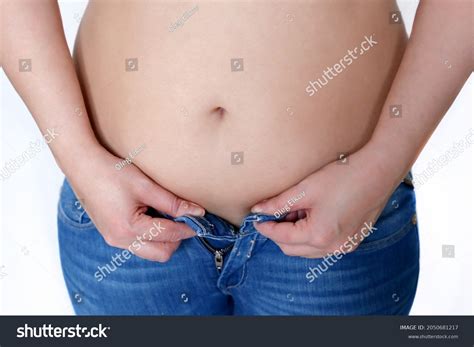 Woman Naked Belly Tries Fasten Her Stock Photo Shutterstock