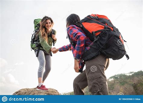 Female Friends Hiking Help Each Other Stock Photo Image Of Adventure