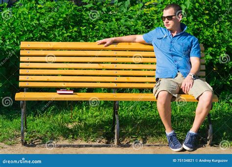 Young Man Sitting On The Bench Stock Image Image Of Handsome Summer 75134821