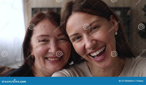Webcam Closeup View Of Faces Old Mom And Adult Daughter Stock Footage