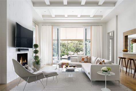 This living room design adapts a minimalist modern style with a calm color combination. 9 Beautiful Contemporary Living Room Designs That You Can Apply - Home & Apartment Ideas