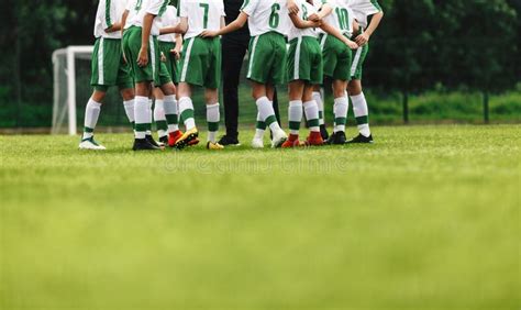 Football Team Huddling Together Stock Photos Free And Royalty Free