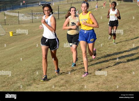 Girls Running In A Cross Country Race Stock Photo Alamy