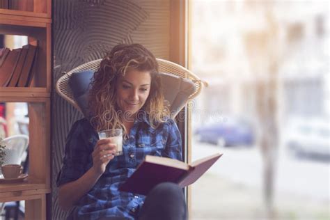 Reading A Book And Drinking Coffee Stock Image Image Of Holding