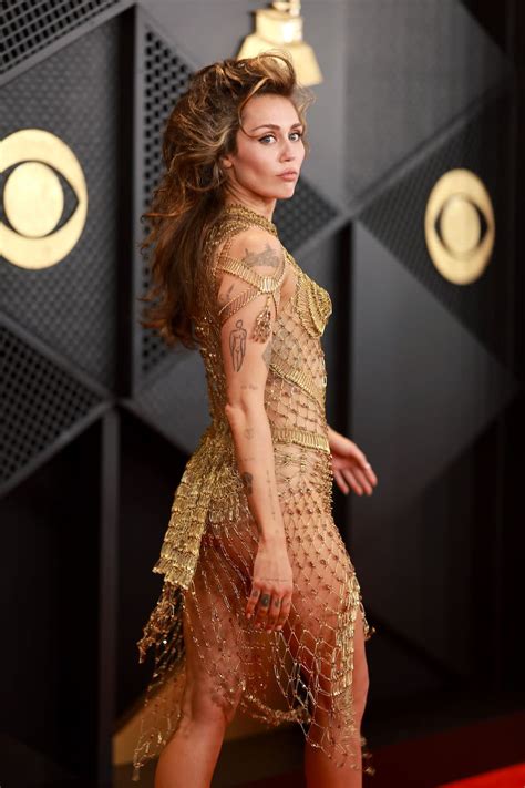 Miley Cyrus Wore A Completely Transparent Gold Netted Dress To The Grammys