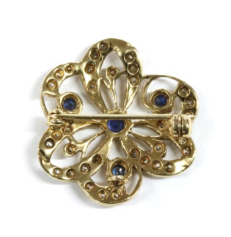 Lot 141 A 9ct Gold Sapphire And Diamond Brooch
