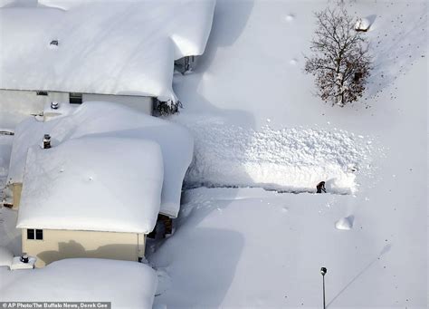 Buildings Collapse And Thirteen Die In Snowstorm That Has Buried New