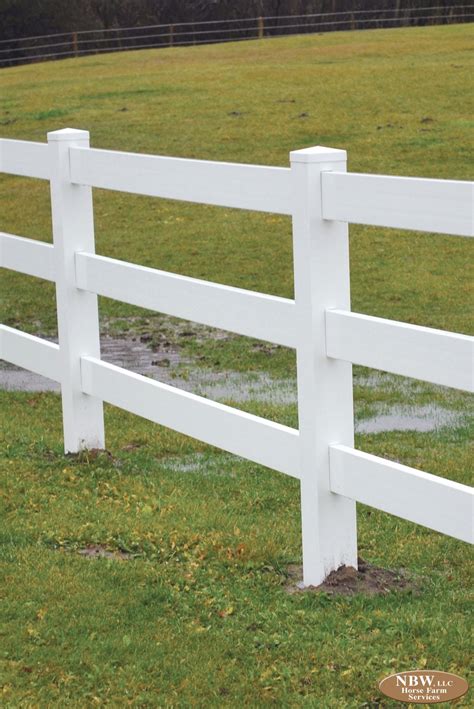 Brown vinyl coating over galvanized chain link has the ability to blend in with the background of natural landscaping. Vinyl Ranch Rail Fence - Horse Farm Services