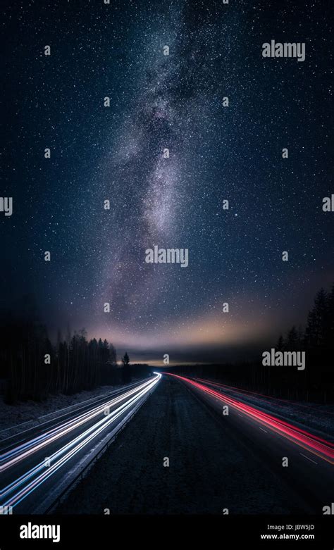 Scenic Night Landscape With Milky Way And Highway Stock Photo Alamy