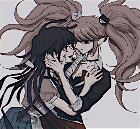Two Anime Characters Hugging Each Other With Long Hair