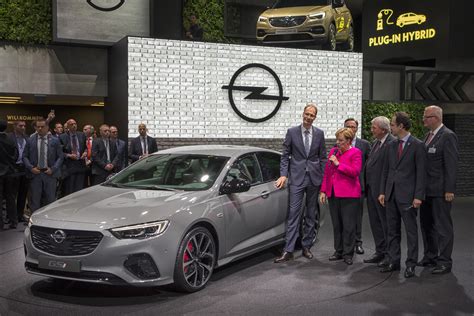 Chancellor angela merkel vowed to speed up germany's transition to electric vehicles, saying in an merkel also expressed concern about whether auto companies were sufficiently innovative in the. Bundeskanzlerin Angela Merkel besucht Opel auf der IAA ...