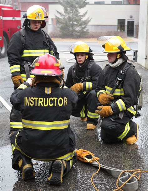Firemen With Instructor Firerescue1 Academy