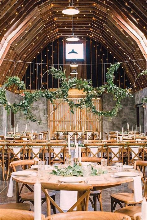 45 rustic wedding decorations you must have a look greenery wreath hanging on the ceiling for