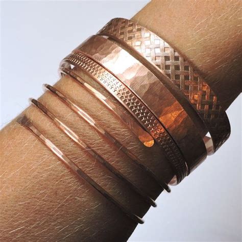 These Bangle Bracelets Have Been Created Using Patterned Copper These