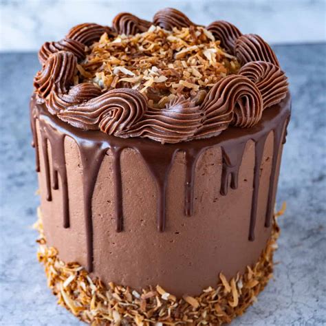 Perfect,rich, and moist chocolate cake with creamy, nutty, coconut, caramel like frosting. The BEST German Chocolate Cake Recipe • A Table Full Of Joy