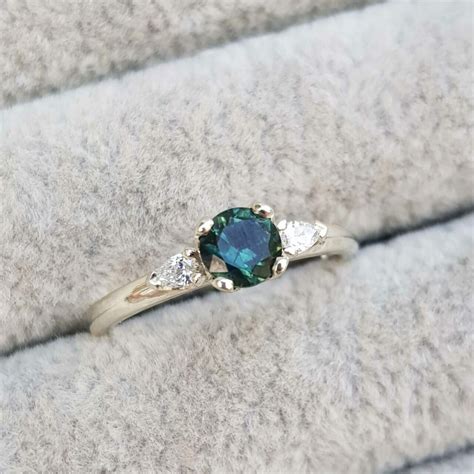 Teal Sapphire Trilogy Engagement Ring With Pear Diamonds Clifton Rocks