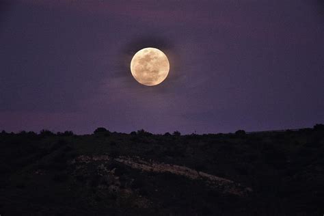Full Moon Rising Over Silhouetted Hillside With Purple Sky 3 Photograph