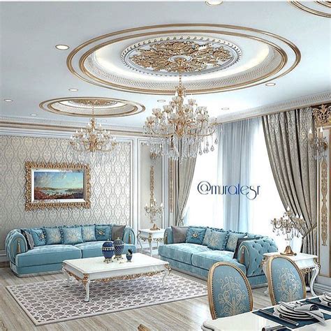 Decorative accents most notably brass marble and natural wood tones uplift the room with pops of brightness. Quite an elegant sitting room with light blue and gold. Very appealing. | Luxury living room ...