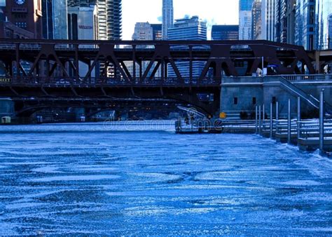 View Of Frozen Chicago River And Riverwalk On A Blue Frigid Morning In