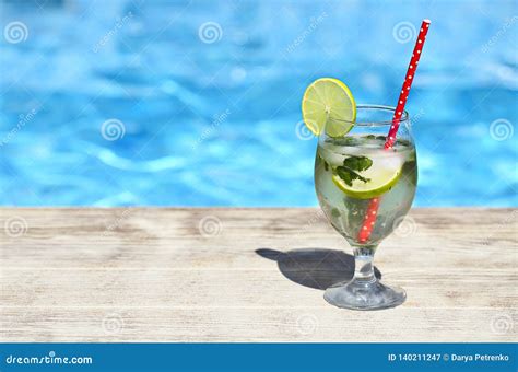 Mojito Cocktail At The Edge Of A Resort Pool Concept Of Luxury Vacation Stock Image Image Of