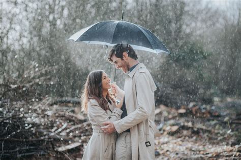 Christie Stephen Kent Engagement Photography Umbrella Rain Photography Shot Couple Wedding