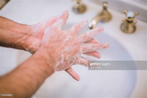 Man Washing Hands Preventing Spread Of Germs Bacteria And Viruses High