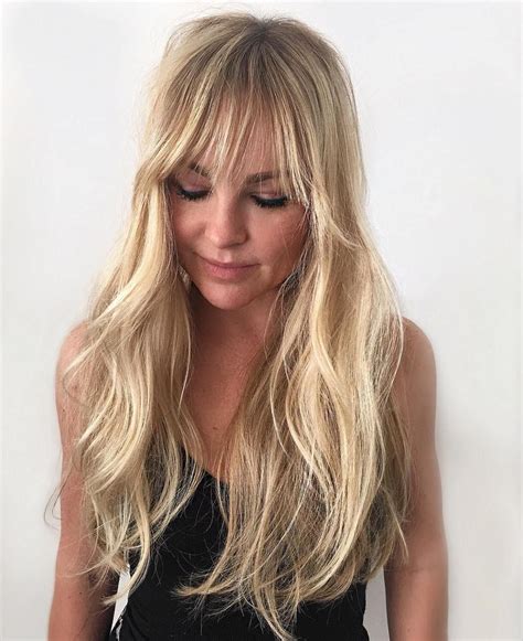Layered Blonde Hair With Bangs Rockwellhairstyles