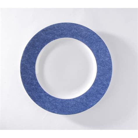 Les rebords perlés sur les assiettes de présentation sont à la mode. Assiette de présentation bleue