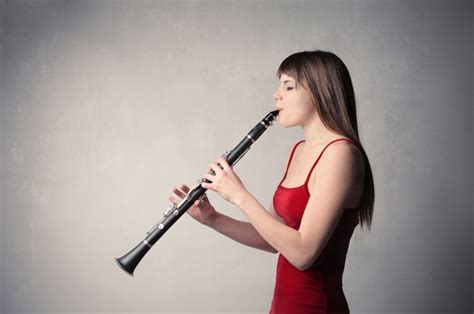 Premium Photo Playing On A Clarinet