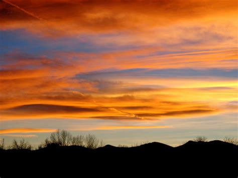 Orange And Blue Sunset Over Rolling Hills Picture Free Photograph