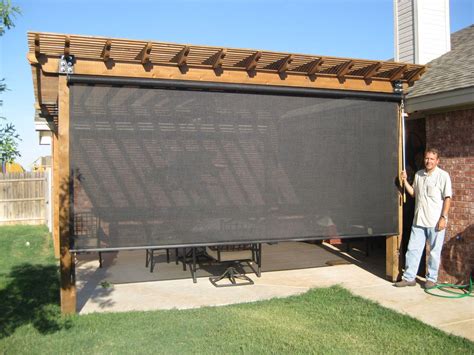 You'll be able to enjoy your backyard while protecting yourself from the sun when you get inspired to build a diy covered patio in this tour. want these for our lanai in FL | Patio shade, Pergola ...