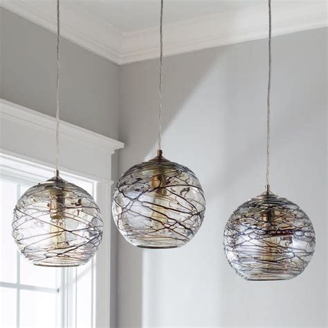 Swirling Glass Globe Pendant Light Clearglassandmetallicbronzewith