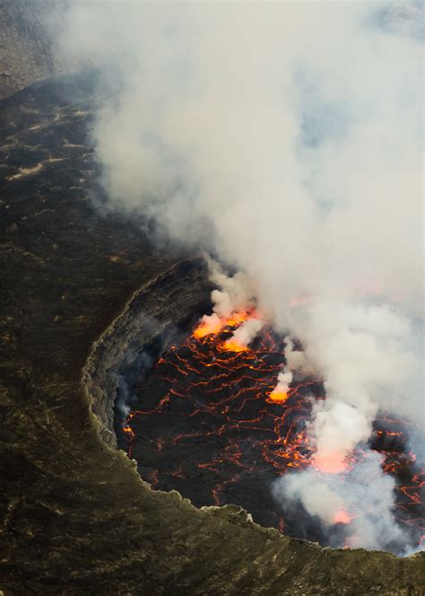 Mount nyiragongo is an active stratovolcano with an elevation of 3,470 m (11,385 ft) in the virunga mountains associated with the albertine rift. A Walk Through Hell: Mount Nyiragongo