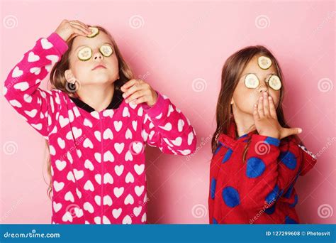 Kids Pose On Pink Background Children With Proud Faces Stock Photo