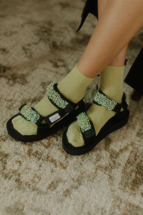 Comme Sis Jenni Lee Breaks Down Her Minimalist Sock Heavy Style Vogue
