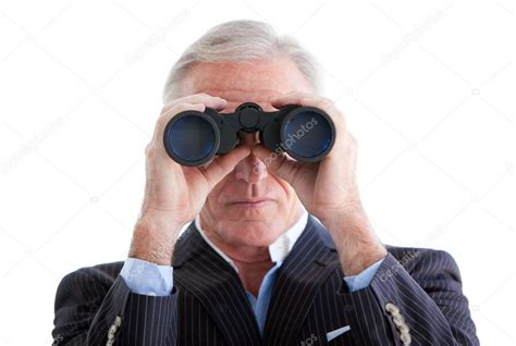 Serious Businessman Looking Through Binoculars Standing Stock Photo By