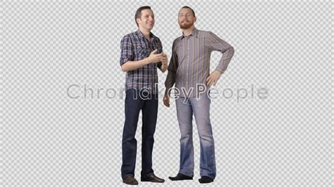 Two Men In Casual Are Standing Side By Side Discussing Laughing
