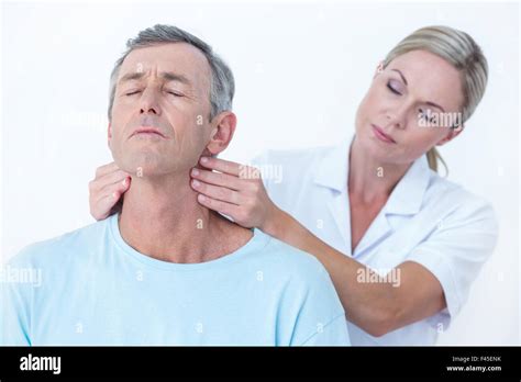 Doctor Stretching Her Patient Neck Stock Photo Alamy