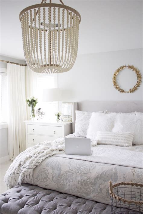 Choose foam or latex mattresses if you plan to use the daybed as a double bed. Beaded chandelier, grey upholstered bed and IKEA Hemnes ...