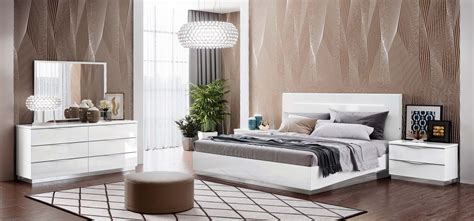 Create contrasts in your bedroom with black string lights on a white wall. Onda legno white bedroom set by camel group NOVA Interiors