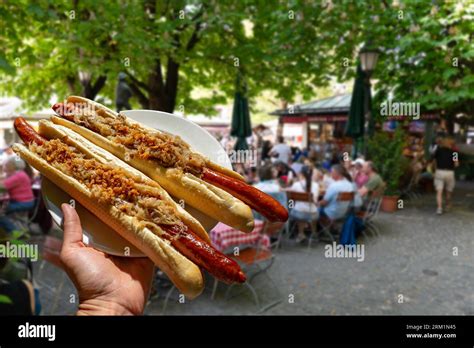 German Bavarian Hot Dog In Viktualienmarkt Munich With Sauerkraut