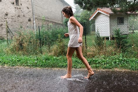 Teen In The Rain By Stocksy Contributor Léa Jones Stocksy