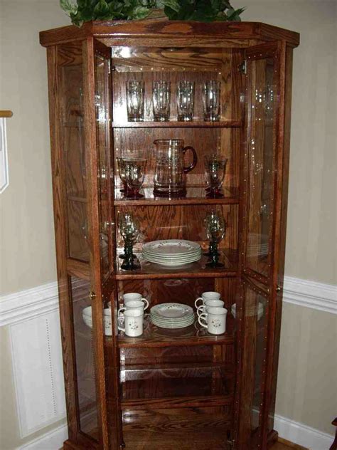 If you have china cabinet display pieces, like this one made to hold a cup and saucer (left), they can be a good way to show off a pattern and get some height in the display. Decorating China Cabinet - Home Furniture Design