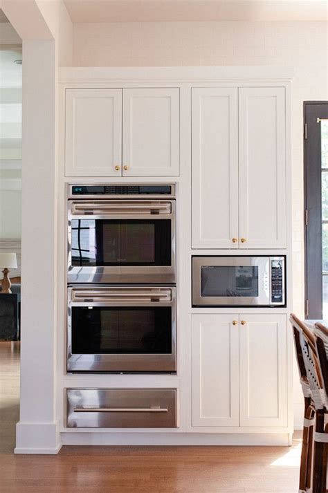 Question i almost made a serious error while cutting out a double oven opening in a factory built cabinet. I love the sizing of the cupboards with the microwave.the ...
