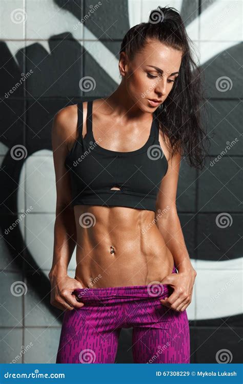 Fitness Woman Showing Abs And Flat Belly Beautiful Muscular Girl Shaped Abdominal Slim Waist