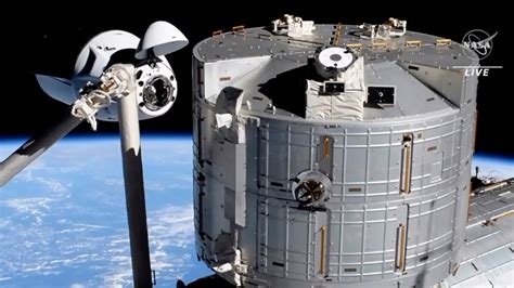 Recycled Spacex Capsule Docks At International Space Station