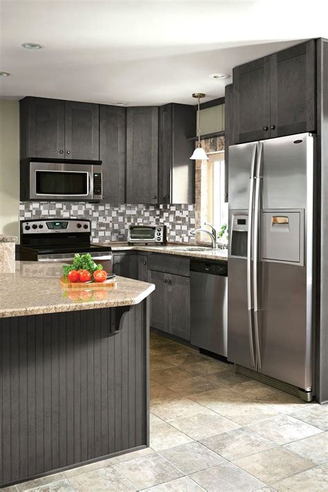 Like white stained cabinets, gray stained cabinets have become popular and can be used in small kitchens to make the room appear larger. Dartmouth Grey Stain Kitchen Cabinets