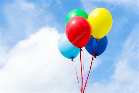 Colorful Balloons In Blue Sky — Stock Photo © Leungchopan 80835998