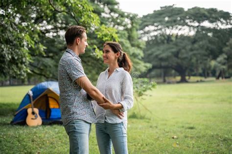 Picnic And Camping Time Young Couple Lying On Grass With The Romantic Feeling Love And